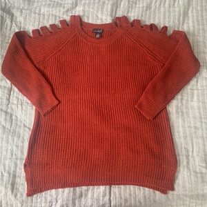 Brand new rust colored sweater with cutouts on upper sleeves